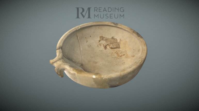 pottery bowl with food remains inside