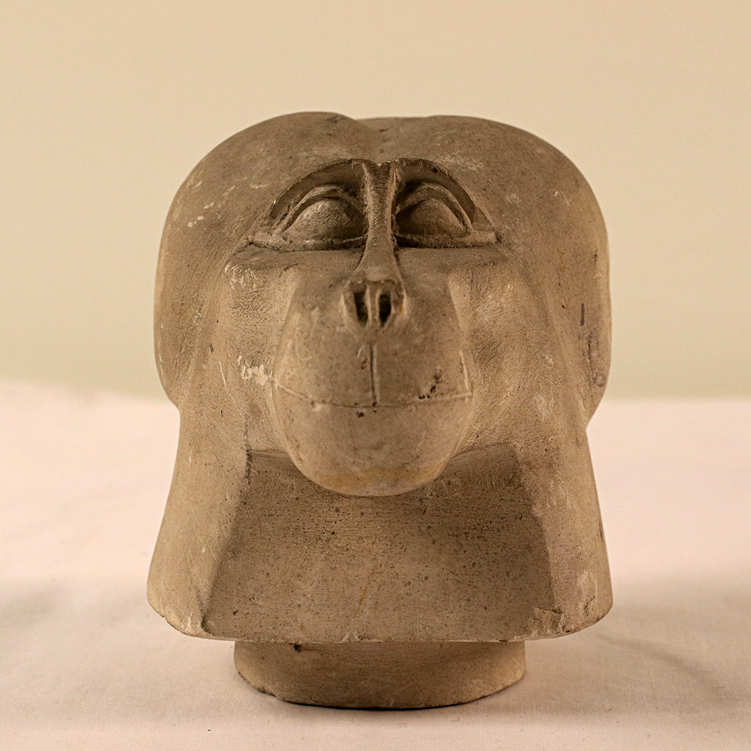Ancient Egyptian canopic jar in the form of a baboon’s head