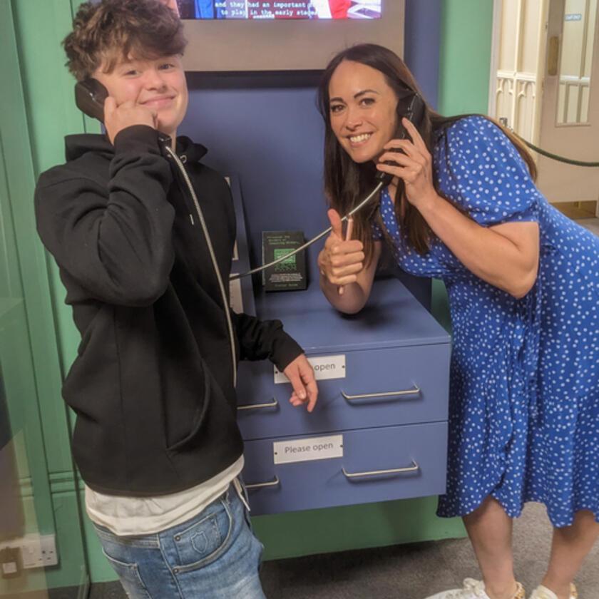 Visitors listen to oral histories