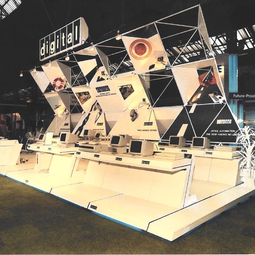 Computers on display in DEC trade show stand, 1985.