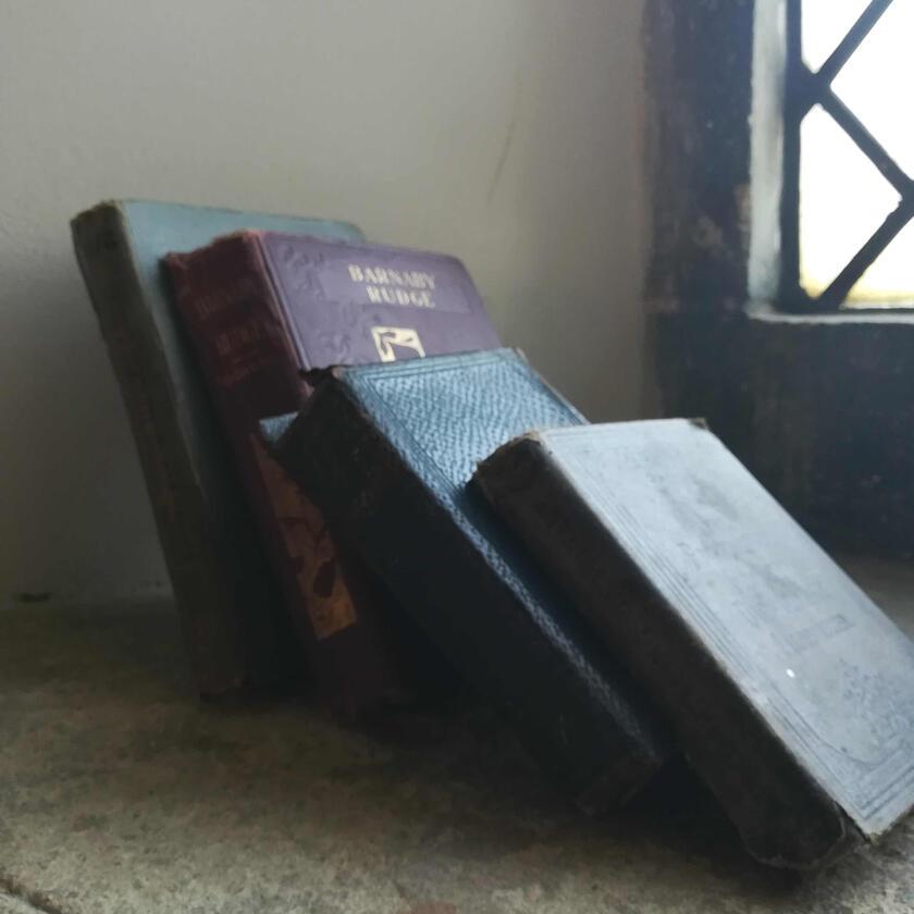 a few books near a window in the Victorian Schoolroom